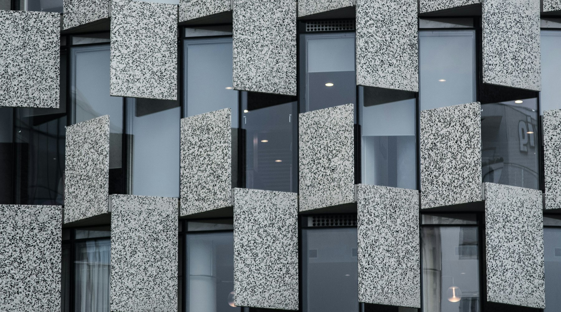 Stone lattice facade of a modern building